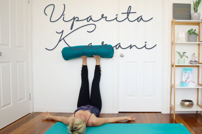 Legs Up the Wall Pose (Viparita Karani) with Bolster Yoga Pose